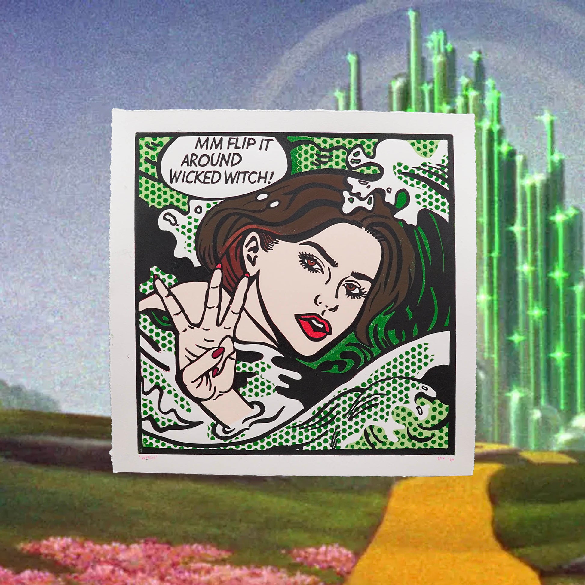A square sticker or art print featuring a pop-art illustration of a woman with the text 'MM FLIP IT AROUND WICKED WITCH!' on a white border, shown against a fantasy landscape background with green glowing trees and a yellow path.